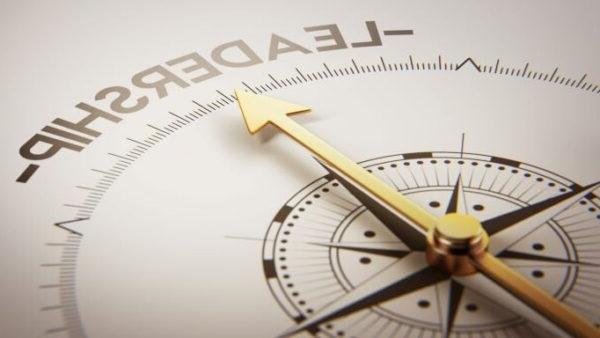 compass pointing to the word leadership